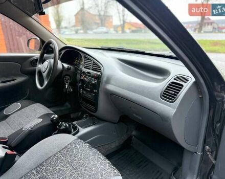 Черный Дэу Ланос, объемом двигателя 1.5 л и пробегом 225 тыс. км за 2999 $, фото 23 на Automoto.ua