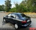 Черный Дэу Ланос, объемом двигателя 1.5 л и пробегом 212 тыс. км за 1550 $, фото 1 на Automoto.ua