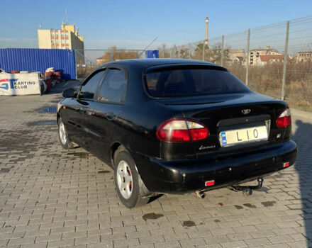 Черный Дэу Ланос, объемом двигателя 1.4 л и пробегом 177 тыс. км за 1750 $, фото 3 на Automoto.ua