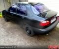 Черный Дэу Ланос, объемом двигателя 1.5 л и пробегом 230 тыс. км за 2000 $, фото 3 на Automoto.ua