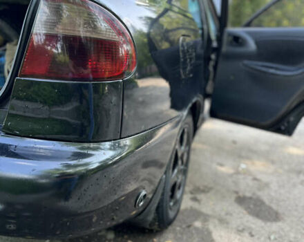 Черный Дэу Ланос, объемом двигателя 1.5 л и пробегом 300 тыс. км за 2400 $, фото 5 на Automoto.ua