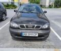 Черный Дэу Ланос, объемом двигателя 1.5 л и пробегом 226 тыс. км за 1400 $, фото 1 на Automoto.ua