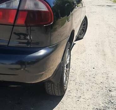 Деу Ланос 2008 у Запоріжжя на Automoto.ua Чорний Деу Ланос, об'ємом двигуна 1.5 л та пробігом 104 тис. км за 2700 $, фото 8 на Automoto.ua