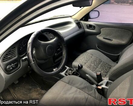 Чорний Деу Ланос, об'ємом двигуна 1.5 л та пробігом 198 тис. км за 1700 $, фото 6 на Automoto.ua