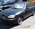 Чорний Деу Ланос, об'ємом двигуна 1.39 л та пробігом 160 тис. км за 2400 $, фото 1 на Automoto.ua