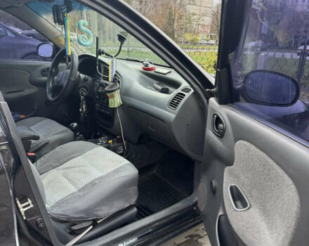 Черный Дэу Ланос, объемом двигателя 1.5 л и пробегом 142 тыс. км за 2799 $, фото 7 на Automoto.ua