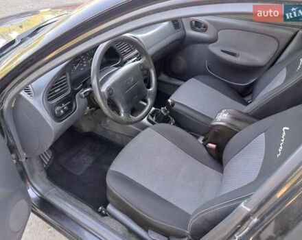 Черный Дэу Ланос, объемом двигателя 1.6 л и пробегом 160 тыс. км за 2700 $, фото 4 на Automoto.ua