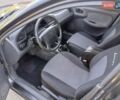 Черный Дэу Ланос, объемом двигателя 1.6 л и пробегом 160 тыс. км за 2700 $, фото 4 на Automoto.ua