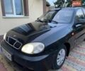 Чорний Деу Ланос, об'ємом двигуна 1.5 л та пробігом 163 тис. км за 1900 $, фото 1 на Automoto.ua