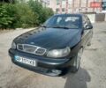 Черный Дэу Ланос, объемом двигателя 1.5 л и пробегом 184 тыс. км за 3200 $, фото 1 на Automoto.ua