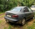 Чорний Деу Ланос, об'ємом двигуна 1.6 л та пробігом 238 тис. км за 1300 $, фото 1 на Automoto.ua