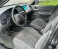 Черный Дэу Ланос, объемом двигателя 1.5 л и пробегом 260 тыс. км за 1500 $, фото 1 на Automoto.ua