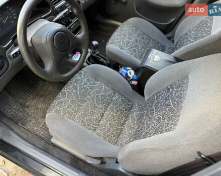 Черный Дэу Ланос, объемом двигателя 1.5 л и пробегом 100 тыс. км за 2900 $, фото 14 на Automoto.ua