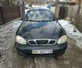 Черный Дэу Ланос, объемом двигателя 1.5 л и пробегом 140 тыс. км за 2650 $, фото 1 на Automoto.ua