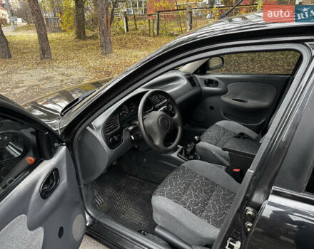 Чорний Деу Ланос, об'ємом двигуна 1.5 л та пробігом 220 тис. км за 2199 $, фото 9 на Automoto.ua