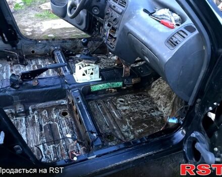 Черный Дэу Ланос, объемом двигателя 1.5 л и пробегом 368 тыс. км за 1150 $, фото 9 на Automoto.ua