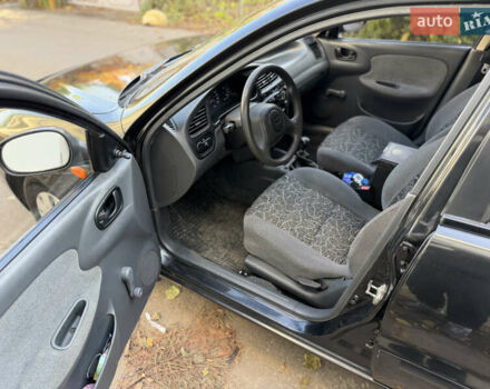 Черный Дэу Ланос, объемом двигателя 1.5 л и пробегом 100 тыс. км за 2900 $, фото 13 на Automoto.ua