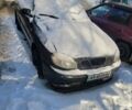 Черный Дэу Ланос, объемом двигателя 1.5 л и пробегом 170 тыс. км за 2000 $, фото 1 на Automoto.ua