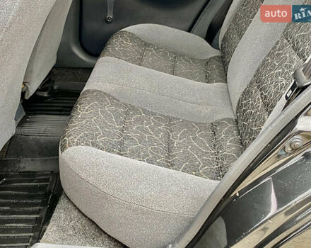 Черный Дэу Ланос, объемом двигателя 1.5 л и пробегом 198 тыс. км за 2600 $, фото 21 на Automoto.ua