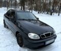 Черный Дэу Ланос, объемом двигателя 1.5 л и пробегом 1560 тыс. км за 3300 $, фото 1 на Automoto.ua