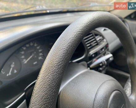 Дэу Ланос 2008 в Кривом Роге на Automoto.ua Черный Дэу Ланос, объемом двигателя 1.5 л и пробегом 105 тыс. км за 2700 $, фото 6 на Automoto.ua