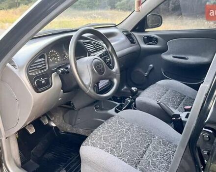 Чорний Деу Ланос, об'ємом двигуна 1.5 л та пробігом 161 тис. км за 3150 $, фото 9 на Automoto.ua
