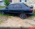 Черный Дэу Ланос, объемом двигателя 1.6 л и пробегом 0 тыс. км за 1460 $, фото 1 на Automoto.ua