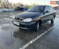 Черный Дэу Ланос, объемом двигателя 1.5 л и пробегом 195 тыс. км за 2100 $, фото 1 на Automoto.ua