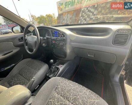 Черный Дэу Ланос, объемом двигателя 1.6 л и пробегом 137 тыс. км за 3600 $, фото 8 на Automoto.ua