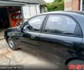 Черный Дэу Ланос, объемом двигателя 1.4 л и пробегом 144 тыс. км за 2100 $, фото 3 на Automoto.ua
