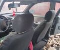 Черный Дэу Ланос, объемом двигателя 1.6 л и пробегом 262 тыс. км за 1850 $, фото 2 на Automoto.ua