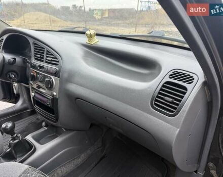 Черный Дэу Ланос, объемом двигателя 1.5 л и пробегом 128 тыс. км за 2999 $, фото 53 на Automoto.ua