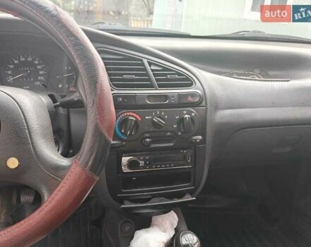 Черный Дэу Ланос, объемом двигателя 1.5 л и пробегом 117 тыс. км за 2800 $, фото 2 на Automoto.ua