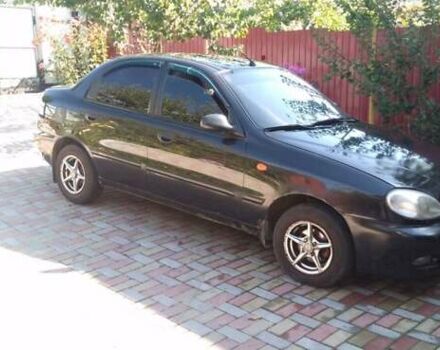 Черный Дэу Ланос, объемом двигателя 1.5 л и пробегом 156 тыс. км за 2000 $, фото 2 на Automoto.ua