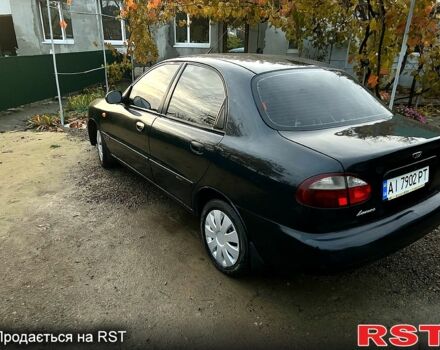 Черный Дэу Ланос, объемом двигателя 1.4 л и пробегом 220 тыс. км за 1800 $, фото 11 на Automoto.ua