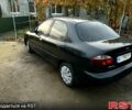 Черный Дэу Ланос, объемом двигателя 1.4 л и пробегом 220 тыс. км за 1800 $, фото 11 на Automoto.ua