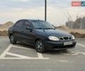 Чорний Деу Ланос, об'ємом двигуна 1.5 л та пробігом 157 тис. км за 1590 $, фото 1 на Automoto.ua