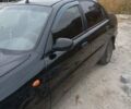 Черный Дэу Ланос, объемом двигателя 1.5 л и пробегом 250 тыс. км за 1700 $, фото 4 на Automoto.ua