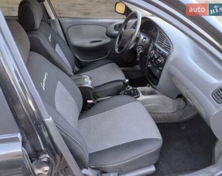 Черный Дэу Ланос, объемом двигателя 1.6 л и пробегом 160 тыс. км за 2700 $, фото 14 на Automoto.ua