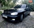 Черный Дэу Ланос, объемом двигателя 1.6 л и пробегом 160 тыс. км за 3150 $, фото 1 на Automoto.ua
