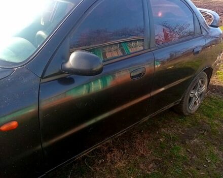 Черный Дэу Ланос, объемом двигателя 1.5 л и пробегом 286 тыс. км за 1000 $, фото 6 на Automoto.ua