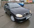 Черный Дэу Ланос, объемом двигателя 1.5 л и пробегом 352 тыс. км за 2000 $, фото 1 на Automoto.ua