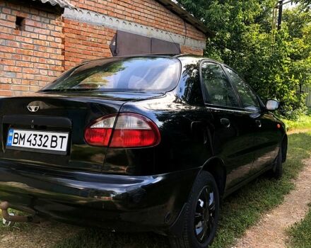 Чорний Деу Ланос, об'ємом двигуна 1.5 л та пробігом 162 тис. км за 2800 $, фото 1 на Automoto.ua