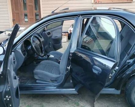 Черный Дэу Ланос, объемом двигателя 1.3 л и пробегом 160 тыс. км за 2000 $, фото 1 на Automoto.ua