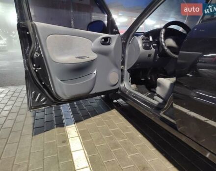 Чорний Деу Ланос, об'ємом двигуна 1.5 л та пробігом 147 тис. км за 2350 $, фото 12 на Automoto.ua