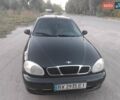 Чорний Деу Ланос, об'ємом двигуна 1.5 л та пробігом 193 тис. км за 3100 $, фото 1 на Automoto.ua