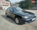 Черный Дэу Ланос, объемом двигателя 1.5 л и пробегом 184 тыс. км за 3200 $, фото 2 на Automoto.ua