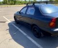 Черный Дэу Ланос, объемом двигателя 1.5 л и пробегом 251 тыс. км за 1350 $, фото 1 на Automoto.ua