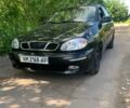 Чорний Деу Ланос, об'ємом двигуна 1.6 л та пробігом 84 тис. км за 2600 $, фото 1 на Automoto.ua