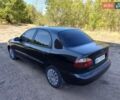 Черный Дэу Ланос, объемом двигателя 1.6 л и пробегом 160 тыс. км за 2700 $, фото 8 на Automoto.ua